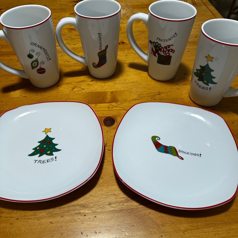 Four tall mugs and two plates